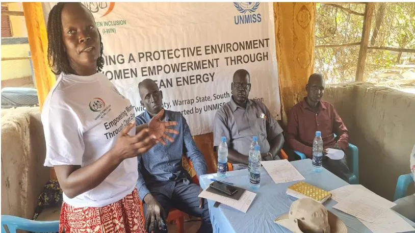 A community representative addresses stakeholders at the official project launch in Twic County.
