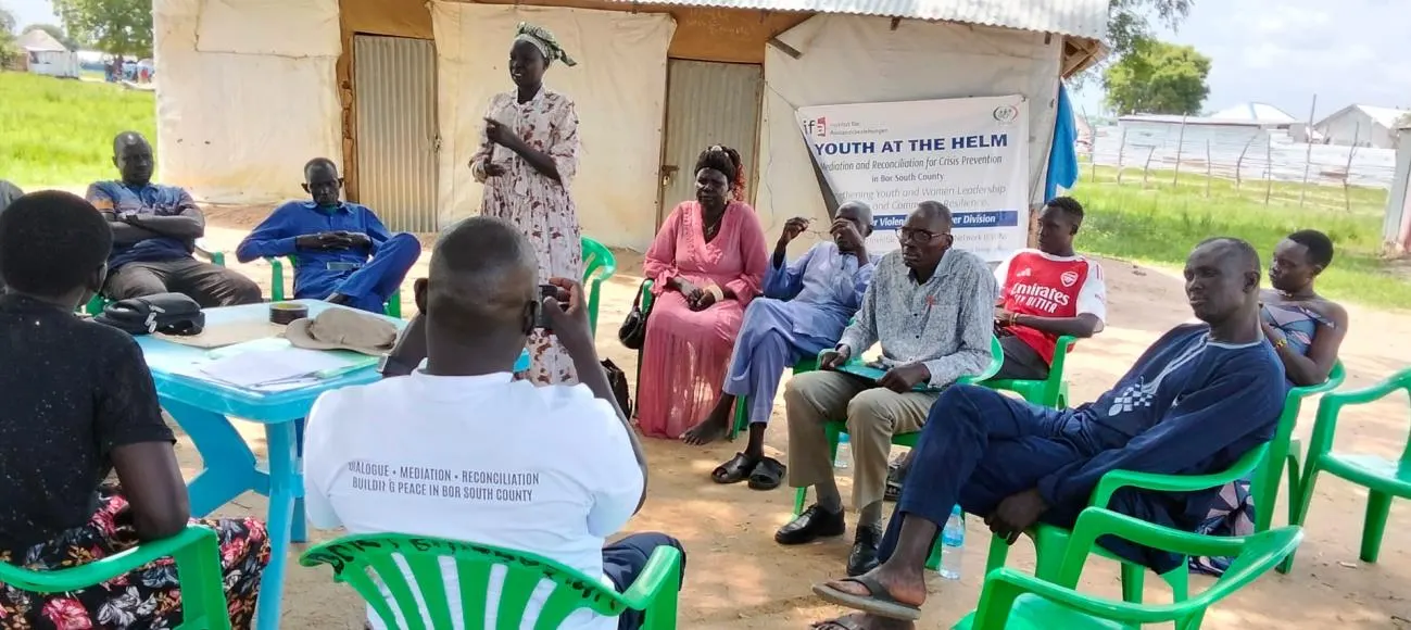 Youth representatives contributing ideas during community consultations.
